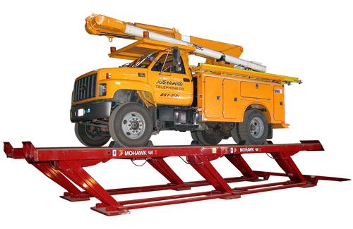 Utility truck on a Mohawk parallelogram lift