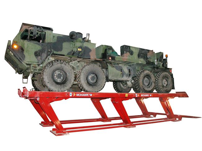 Military heavy truck on a Mohawk parallelogram lift