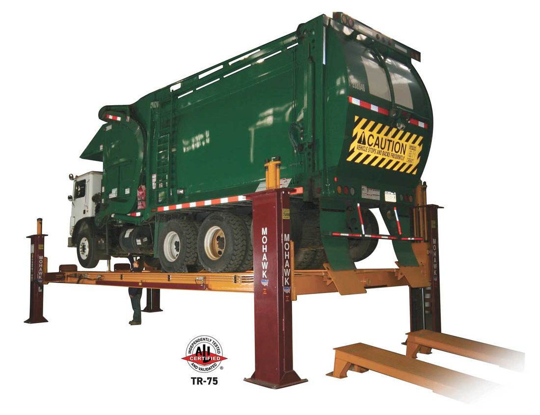 Refuse truck raised on a Mohawk TR Series lift